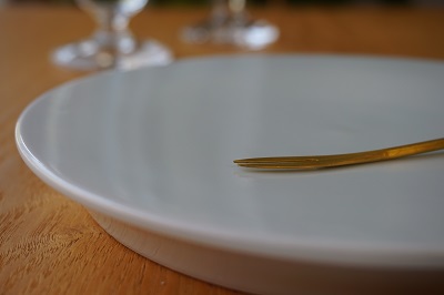 #41-b flat round plate with brass fork.jpg